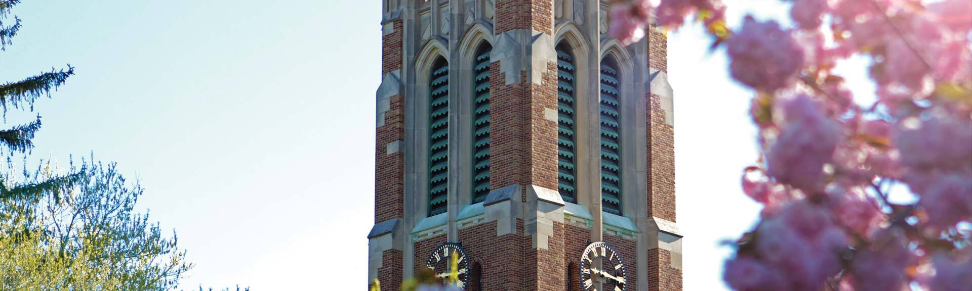 Photograph of Beaumont Tower on a sunny day at Michigan State University